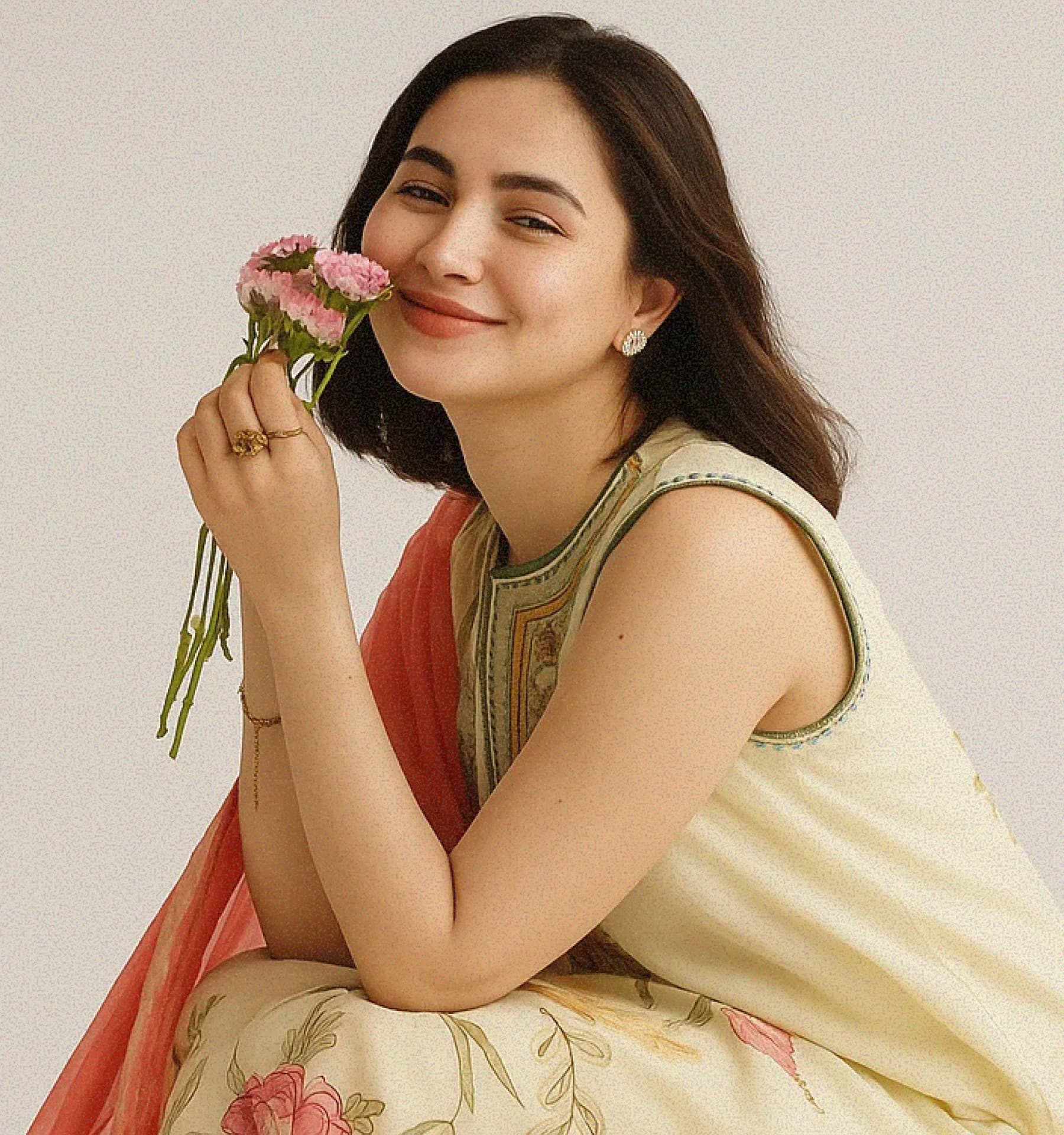 Smiling woman with flowers